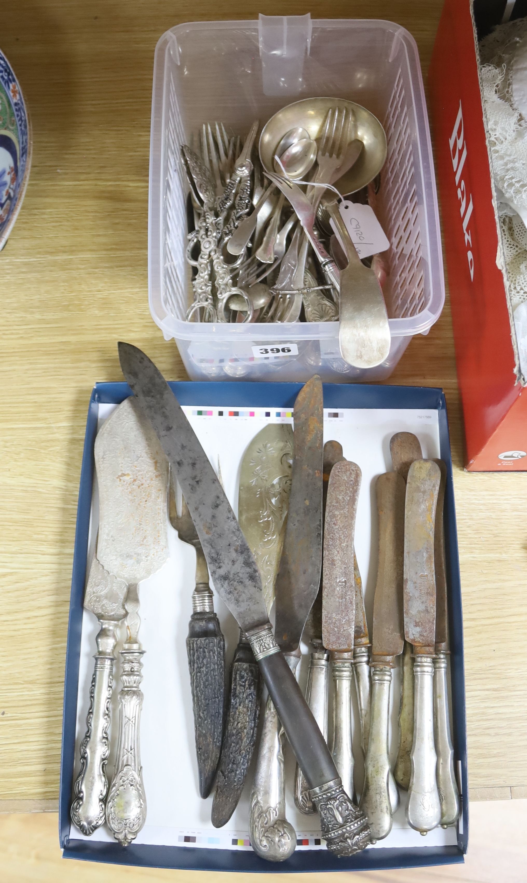 A collection of plated flatware